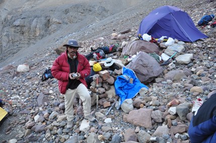 ABC, Kaivalya holding special rock